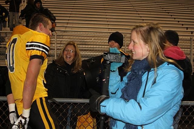 Amanda, here interviewing Grant Udinski after a game this year, was a regular with her video camera on the CB West sidelines.