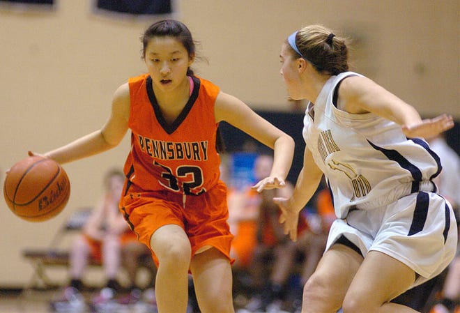 Pennsbury's Maggie Kane (32) pushes past Council Rock South's Payton Spadaccino (11)during their game at Council Rock South at Council Rock South on Thursday night.