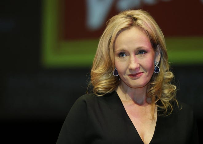 J.K. Rowling, seen in a 2012 file photo, says she is working on a play about Harry Potter's life before he attended Hogwarts School of Witchcraft and Wizardry.