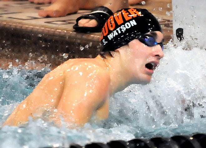 Hoover swimmer Stephen Watson looks for his time at the finish of his 5-yard freestyle race during the Canton City Schools Christmas Invitational at C.T. Branin Natatorium.