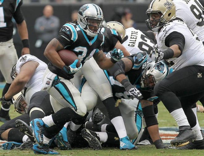 The Panthers' DeAngelo Williams breaks free for a 43-yard touchdown in Sunday' 17-13 win.