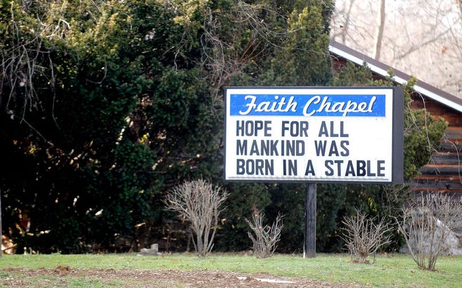 Faith Chapel in Cambria, Ill., has a simple message on its sign for the holiday season. A number of churches are now using catchy and clever messages on their signs to draw visitors. (AP Photo/The Southern Illinoisan, Adam Testa)
