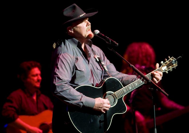 MATT DAYHOFF/JOURNAL STAR
In this Journal Star file photo from March 10, 2012, country singer Trace Adkins performs at the Peoria Civic Center Theater.
