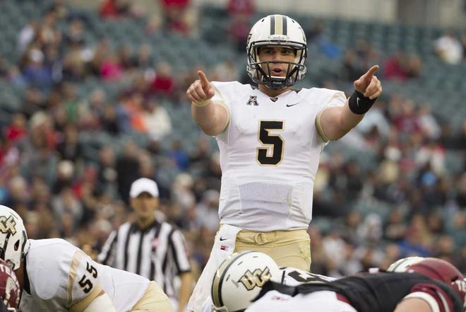 Chris Szagola Associated Press Central Florida quarterback Blake Bortles, projected to be a high first-round pick, directs his team during the third quarter against Temple on Nov. 16 in Philadelphia.