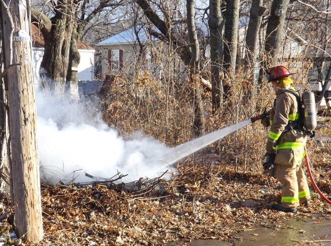 Topeka firefighters put out some intentionally set small brush fires Thursday afternoon behind what appeared to be a vacant house in the 1200 block of S.W. Buchanan.