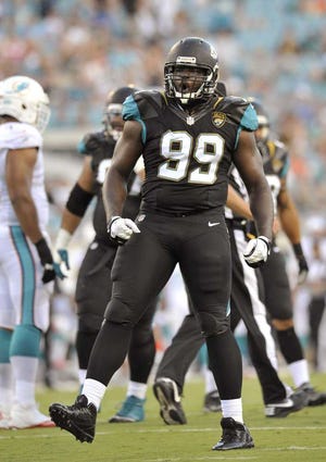 Will.Dickey@jacksonville.com Jaguars defensive tackle Sen'Derrick Marks celebrates after sacking Miami Dolphins quarterback Ryan Tannehill on the first play of a preseason game Aug. 9 at EverBank Field. Marks received a four-year contract extension.