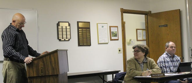 Hillsdale County Commissioners Ruth Brown and Andy Welden (right) listen to Hillsdale County park director Ted Jansen (left) as he speaks to members the Hillsdale County Board of Commissioners Friday. MATT DURR PHOTO