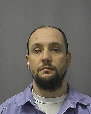 Inmate Christopher Yates, 34 says the Kansas Department of Corrections is discriminating against him by not allowing visits by the man he married in Iowa.