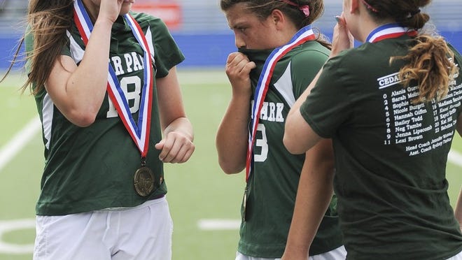 Cedar Park reacts to a 2-1 loss during the UIL class 4A girls soccer state semifinal between Highland Park and Cedar Park April 18 at Birkelbach Field in Georgetown.