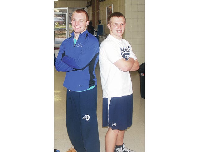 Brothers Tim Hamilton, left, and Mike Hamilton, have been a wrestling dynasty in stereo for Bartlesville High School. Tim captured three state grappling titles from 2010-12, while Michael last year earned his first Class 6A crown. The pair are shown above from 2011. Mike Tupa/Examiner-Enterprise/File