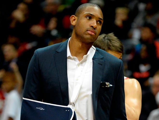 Center Al Horford suffered a torn right pectoral muscle Thursday against Cleveland. (The Associated Press)