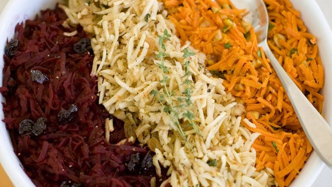 Shredded beets with balsamic, from left, shredded parsnips with walnuts, and shredded spicy carrots.