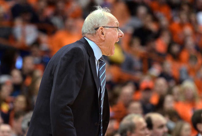 Syracuse \coach Jim Boeheim yells to his players during the second half of an NCAA college basketball game against Eastern Michigan in Syracuse, N.Y., Tuesday, Dec. 31, 2013. Syracuse won 70-48. (AP Photo/Kevin Rivoli)