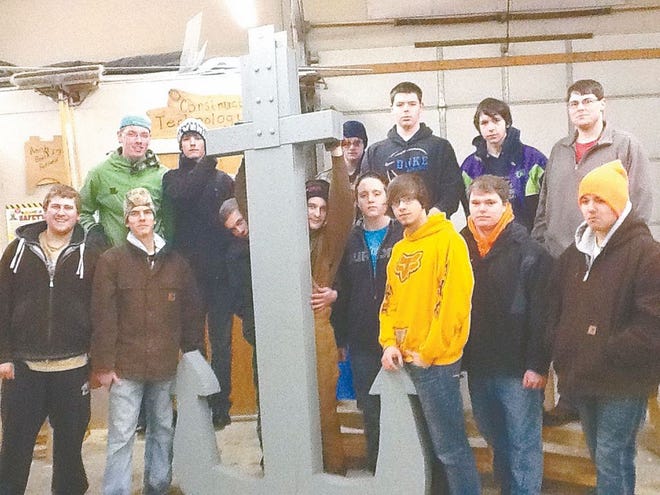 These students from the Cheboygan Area High School Building Trades and Welding classes helped construct an 8-foot anchor for Cheboygan’s New Year’s Eve anchor drop. They also created the “2014” which will light up when the anchor drops at the stroke of midnight. For more about the events of tonight’s drop, see Kirsten Guenther’s column on Page A4.