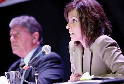 Herald file photo Alicia Ferrante, right, and Gary Chiusano, debate the qualifications for the county surrogate’s position in May 2013. Chiusano won election to the post.