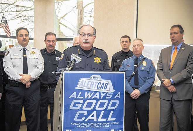 “There’s plenty of room at Carl’s No-Frills Motel,” says Orange County Sheriff Carl DuBois, who urged drivers to take advantage of Dana Distributors’ Alert Cab Program and not “become another statistic.”