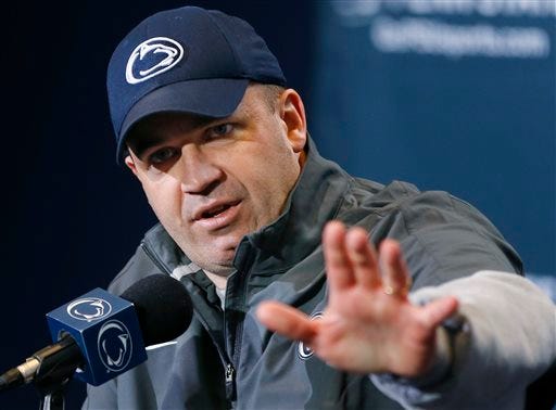 Penn State coach Bill O'Brien answers questions during a news conference in State College, Pa. Two people familiar with the negotiations said Tuesday night, Dec. 31, 2013, that O'Brien has reached an agreement to coach the Houston Texans. The people spoke to The Associated Press on the condition of anonymity because an official announcement hasn't been made.
