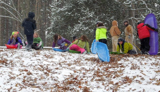 Sledding during Winter Fest at Kimball Camp is a highlight for participants. COURTESY PHOTO