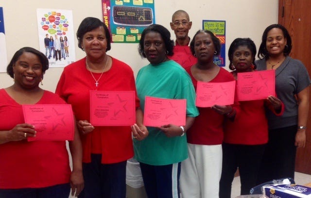 Successfully completing the course includes from left, Joyce Bernstein, Irma Smith, Loretta Locket, Laura Becnel, Walter Brocks, Sr., Pauletta Ricard, Josie Taylor and instructor Ayanna Penn.