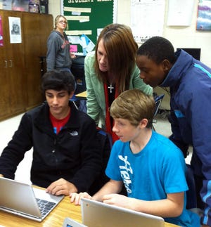 Bryan County Middle School technology resource teacher Tiffany Hursey worked with students on creating a spreadsheet for math and science classes with the BCMS' new chrome book cart. Students were excited to learn how to enter science data into their Google drive and create a scatter plot.
