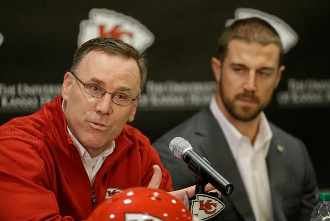 Kansas City Chiefs general manager John Dorsey, left, shown during the formal introduction of new Chiefs' quarterback Alex Smith last March, has played a major role in turning a 2-14 team in 2012 into 2013's 11-5 squad that will play Indianapolis on Saturday in the AFC wild-card round.