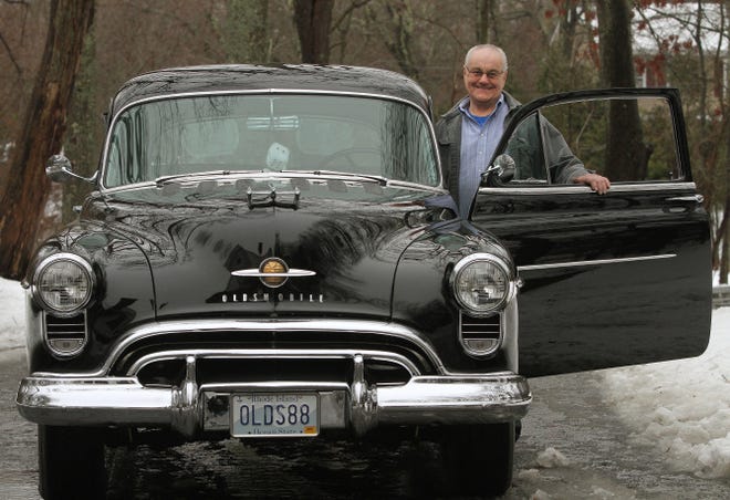 Frank Bradley of North Kingstown restored his 1950 Oldsmobile 88, one of five he owns.