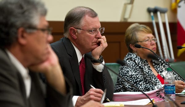 Stockton Unified Superintendent Steve Lowder listens to a speaker during Friday's board meeting.