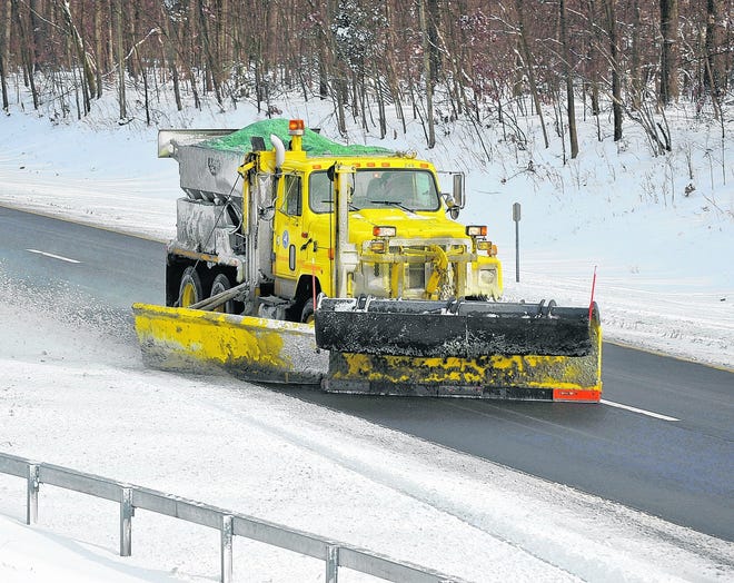 Gov. Andrew Cuomo said he decided to close a stretch of the Thruway Friday morning to ensure safety and expedite plowing. A plow travels south on the Thruway Friday morning in New Paltz. Saturday will be warmer, but another storm is expected Monday.