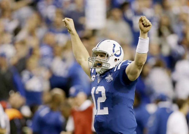 Indianapolis Colts quarterback Andrew Luck (12) celebrates after throwing a touchdown pass against the Kansas City Chiefs during the second half of an NFL wild-card playoff football game Saturday, Jan. 4, 2014, in Indianapolis. (AP Photo/Michael Conroy)