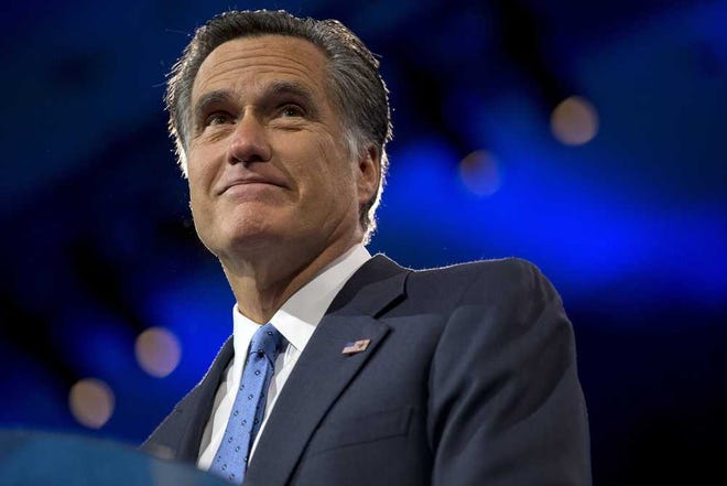 FILE - This March 15, 2013 file photo shows former Massachusetts Gov., and 2012 Republican presidential candidate, Mitt Romney at the 40th annual Conservative Political Action Conference in National Harbor, Md. Romney told "Fox News Sunday" that he has accepted an apology from MSNBC host Melissa Harris-Perry, who joked about a Christmas picture that included the 2012 Republican presidential candidate's adopted, African-American grandson. Romney said that he sees Melissa Harris-Perry's apology as sincere and is ready to move on. (AP Photo/Jacquelyn Martin, File)
