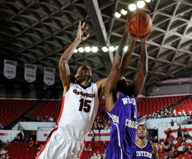 Georgia's Donte' Williams (15) goes for a rebound during a game against Western Carolina on Dec. 21 at Stegeman Coliseum. (Photo by John Kelley)