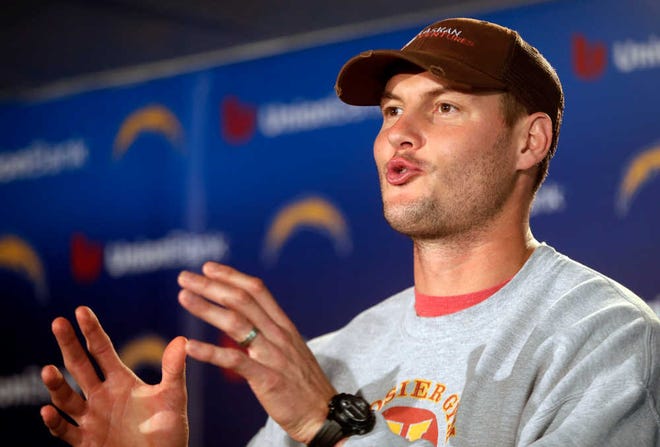 San Diego Chargers quarterback Philip Rivers talks about the Chargers' upset playoff victory over the Cincinnati Bengals and their upcoming game against the Denver Broncos at a news conference Monday, Jan. 6, 2014, in San Diego. (AP Photo/Lenny Ignelzi)