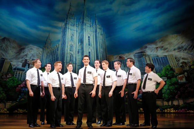 A group of Mormons missionaries are shown in a scene from ‘The Book of Mormon.’