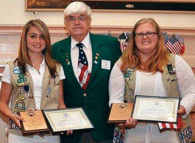 Samantha Elliott, left, and Kyra Warner of Girl Scout Troop 50130 recently earned the coveted “Gold Award.”