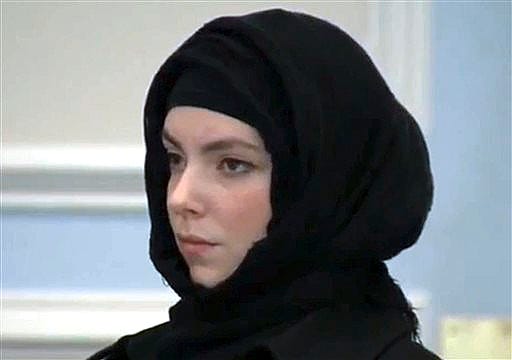 Katherine Russell, widow of Boston Marathon bombing suspect Tamerlan Tsarnaev, stands during a hearing in district court Thursday, Jan. 9, 2013, in Wrentham, Mass., on charges of driving with a suspended license, speeding and driving an unregistered motor vehicle in Franklin, Mass., in August. She was found responsible for speeding, but the other two charges were dismissed. (AP Photo/WCVB-TV, Pool)