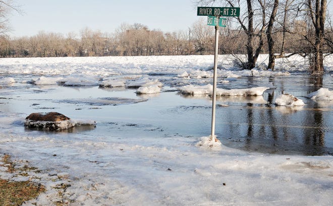 Ice and water flood East Ferry Road and River Road in Lower Makefield Thursday forcing the closure of River Road between Black Rock Road and Calhoun Street in Morrisville.