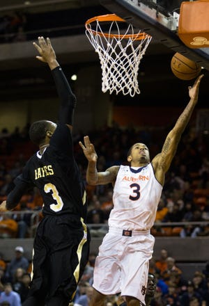 The Missouri basketball team will have its hands full trying to contain Auburn's Chris Denson (3) when it visits Auburn on Saturday. Denson, a slashing guard, is averaging a Southeastern Conference-leading 19.8 points this season and teams with KT Harrell to form the league's highest-scoring duo.