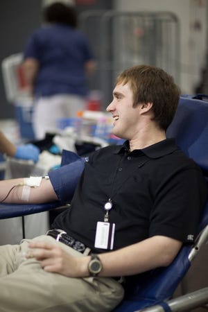 A donor gives blood to the Mississippi Valley Regional Blood Center at a drive in Davenport, Iowa. Recent winter weather has deterred people from giving donations, weakening the blood supply for both the MVRBC and the American Red Cross. PHOTO COURTESY OF THE AMERICAN RED CROSS