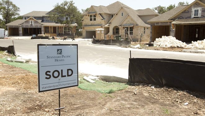 Several homes are under construction on Copper Basin Cove at Northwoods in Avery Ranch in July 5. Austin-area housing starts hit a six-year high in 2013.JANNER / AMERICAN-STATESMAN
