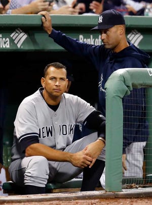 FILE - In this Sept. 13, 2013 file photo, New York Yankees' Alex Rodriguez sits in the dugout as Derek Jeter stands next to him during the first inning of a baseball game against the Boston Red Sox at Fenway Park in Boston. Rodriguez's drug suspension has been cut to 162 games from 211 by arbitrator Fredric Horowitz, a decision sidelining the New York Yankees third baseman the entire 2014 season. (AP Photo/Elise Amendola)