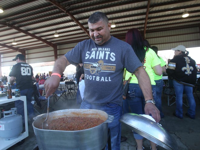 Sukie Guidry cooks up a pot of chili Saturday during the Krewe of Mardi Gras 15th Annual Chili Cook-Off at the Houma Livestock and agriculture Building.