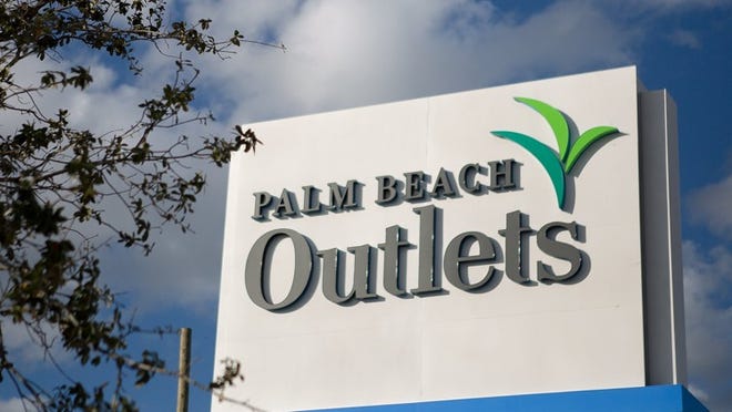 The sign for the new Palm Beach Outlets on Tuesday, December 17, 2013, in West Palm Beach. The outlet mall is set to open on Feb. 14 and will feature over 100 stores. (Madeline Gray/The Palm Beach Post)