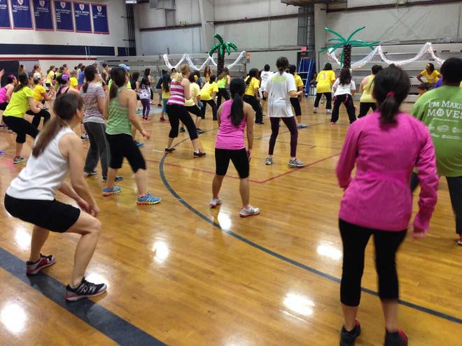 More than 100 Topekans on Saturday joined in a Zumb-A-Thon at the Cair Paravel Latin School, 635 S.W. Clay, to raise money for relief efforts in the Philippines after super-typhoon Yolanda hit on Nov. 8, leaving thousands dead and millions displaced. The Topeka event raised about $1,000.