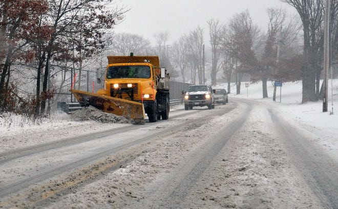 A state plow works a highway near Randolph during the snowstorm that hit New England on Jan. 2.