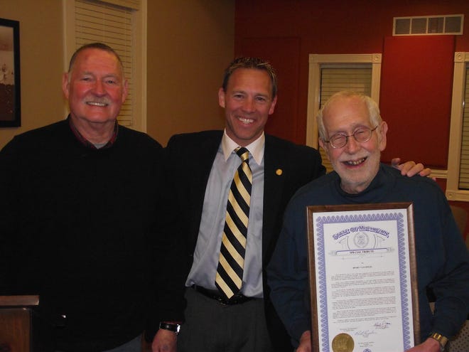 From left, Saugatuck Mayor Bill Hess and state Rep. Bob Genetski, R-Saugatuck, pose with Henry Van Singel after the longtime city councilman and former mayor received a proclamation on Monday from the the governor for his service to the community. Jim Hayden/Sentinel staff