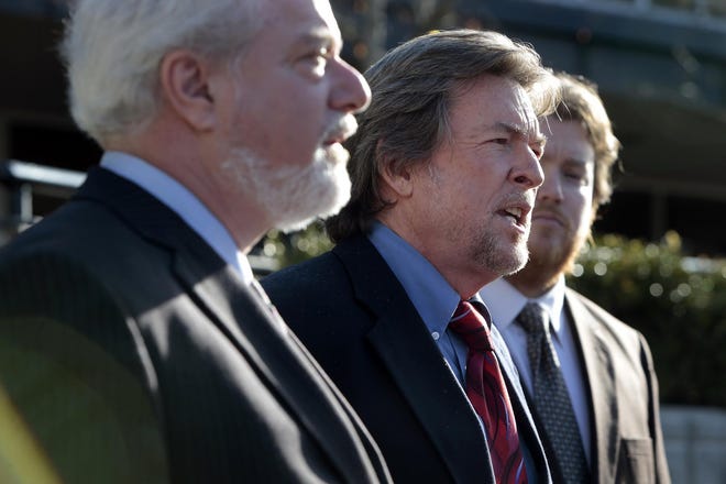 Flanked by his attorneys, former Lane County commissioner Bill Fleenor announced Monday that he has filed lawsuit against the county seeking the secret report on the fired county administrator, Liane Richardson. (Paul Carter/The Register-Guard)

The attorneys: Left, Daniel Stotter. Right, Lance Quaranto