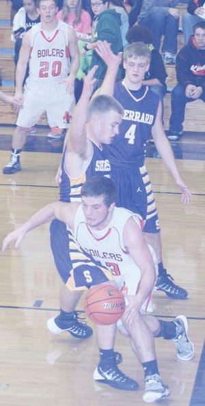 Kewanee’s Dalton Nuding looks for room to operate along the baseline Tuesday night against Sherrard.
