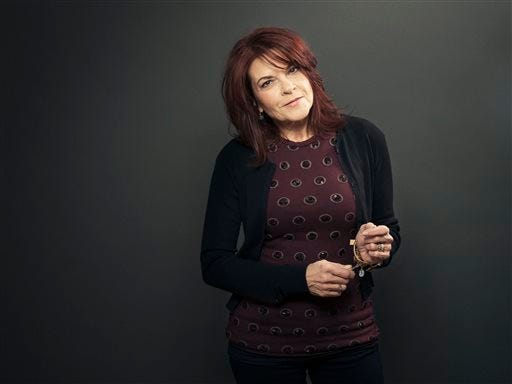 This Dec. 17, 2013 photo shows American singer-songwriter Rosanne Cash during a portrait session to promote her new album, "The River & The Thread" in New York.