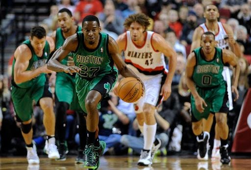 Boston Celtics' Jordan Crawford (27) runs against Portland Trail Blazers after a steal during the first half of an NBA basketball game in Portland, Ore., Saturday, Jan. 11, 2014.