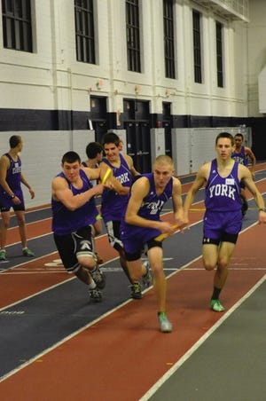 Members of the York High School boys track team compete at last Friday's seven-team season opening meet at the University of Southern Maine in Gorham.